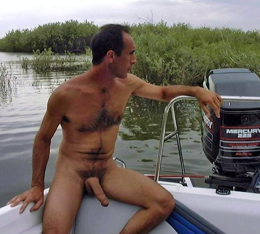 Naked hairy men on boat.