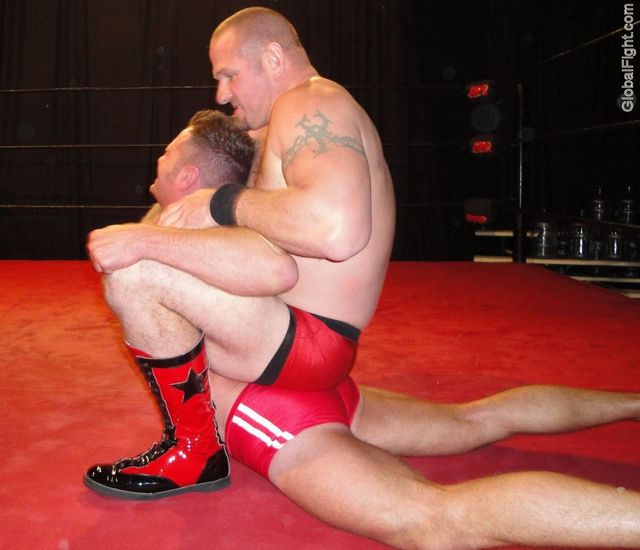 giant muscle men pro wrestling boots tattooed leather arms