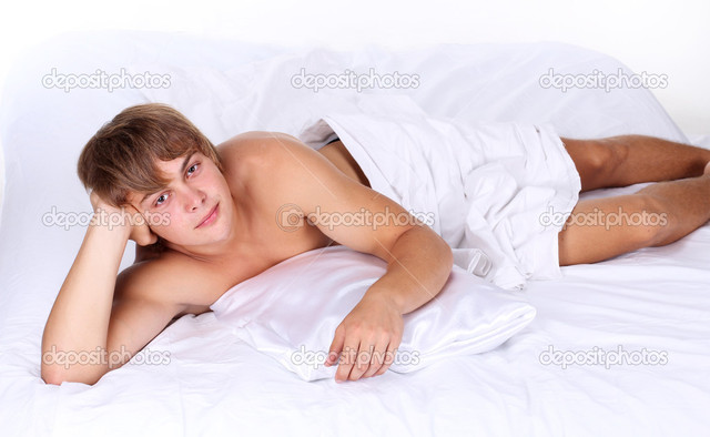 sexy pics man white photo young man bed sexy depositphotos stock lying