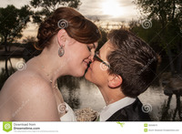 free gay pics kissing married gay couple newlywed lesbians outside near pond royalty free stock photo