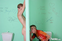 18 gay porn Pictures twinks trading blow jobs gloryhole bathroom amateur gay porn anonymous suck each off restroom