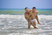 gay men free photo gay men beach vacation royalty free stock photo