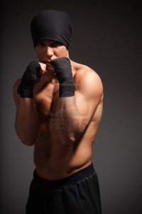 naked muscle mans serrnovik street fighter man boxing naked torso wearing bandanna photo