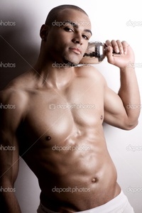 nude bodybuilder depositphotos strong wet sexy nude young bodybuilder posing bottle stock photo