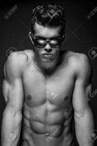 pics of naked male models fxquadro portrait awesome male model sun glasses naked muscular body isolated dark grey backgro stock photo