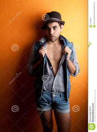 sexy and gay sexy gay man jeans hat stock