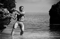 sexy bodybuilder man get fqkhsbn mpm fit sexy bodybuilder holding coral reef bermuda ocean